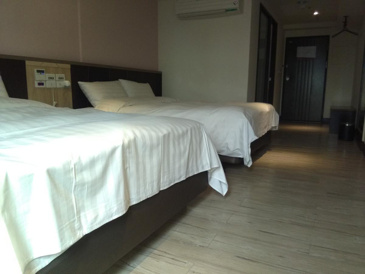 Dengfeng Milan Business Hotel Huwei Exterior photo