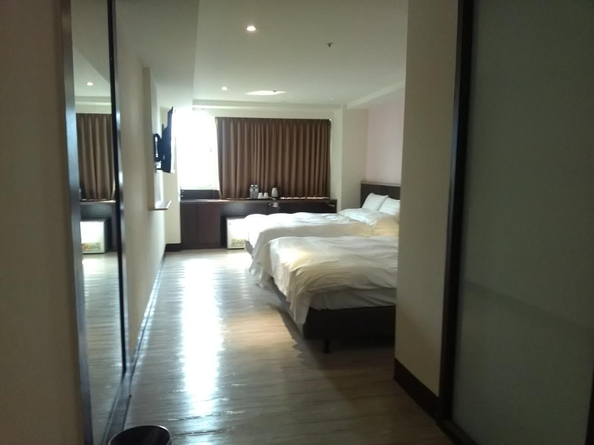 Dengfeng Milan Business Hotel Huwei Exterior photo